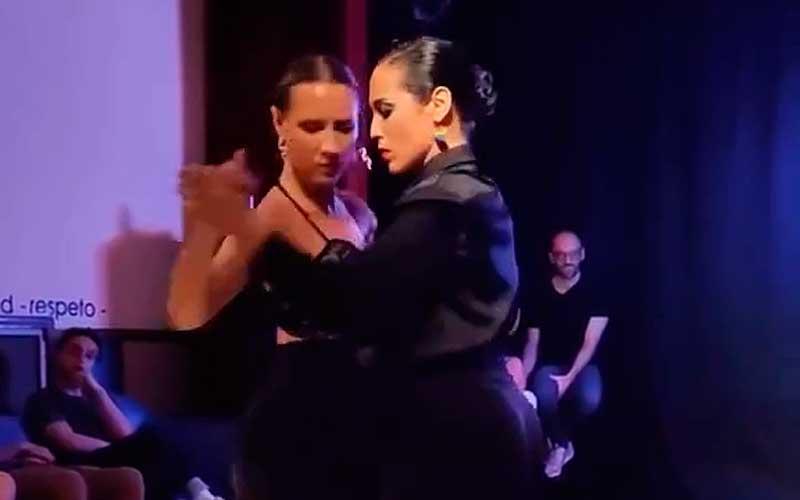 imagen de dos bailarines de tango cuir